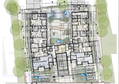 Detaillierter Grundriss eines modernen Mehrfamilienhaus-Komplexes mit Innenhof, Grünflächen und klar strukturierten Wohnbereichen.