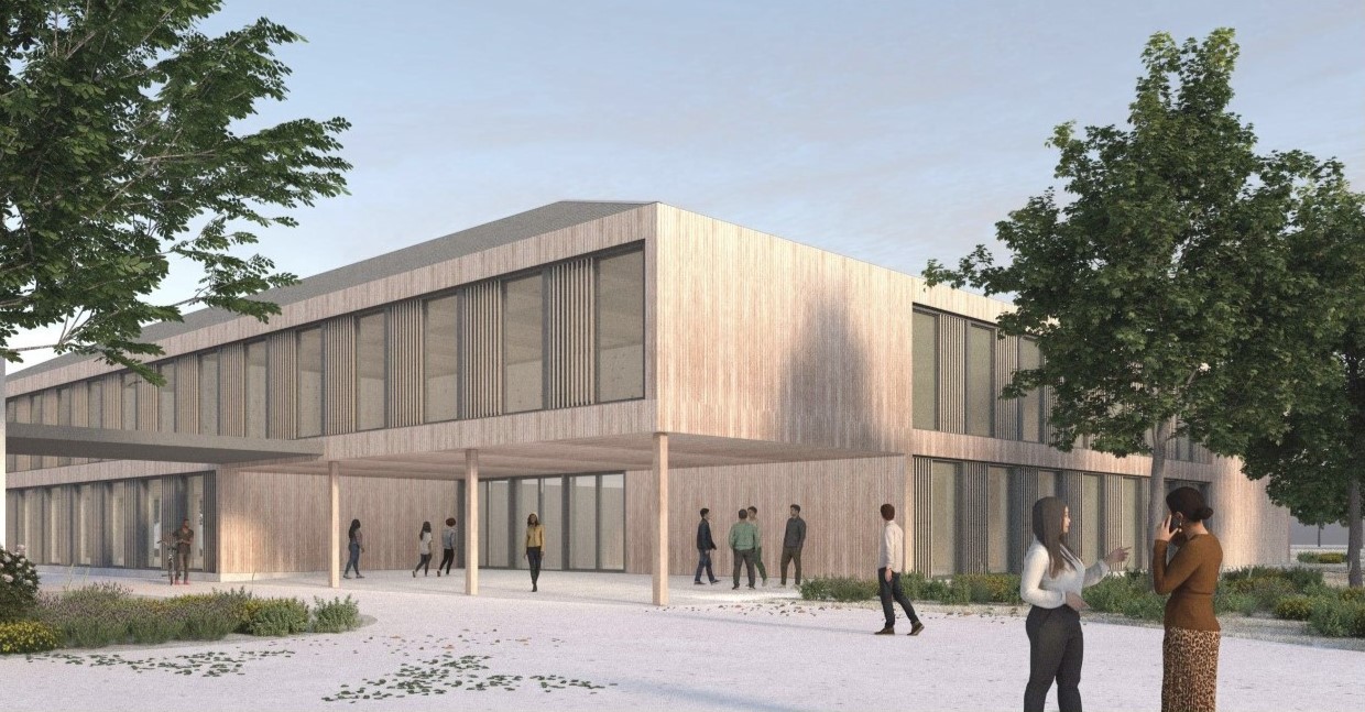 Perspektive des Schulhofs vor dem Erweiterungsbau der Fachakademie Aichach, Holzmodulbau mit großen Fensterfronten